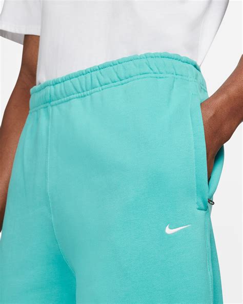 Nike Solo Swoosh Mens Fleece Pants Green Cw5460 393 Buy Online At Footdistrict