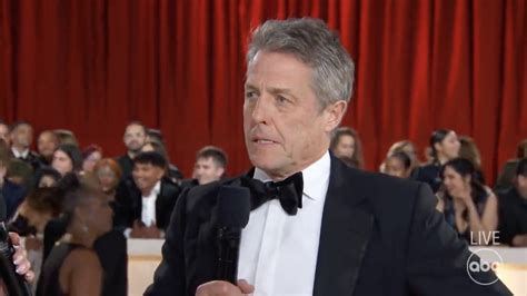 Who Is Holding Hugh Grant Hostage At The 2023 Oscars