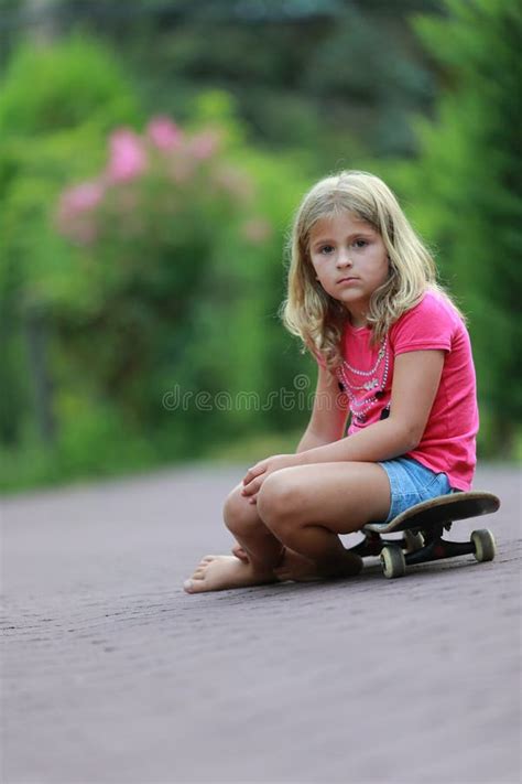 Girl On Skateboard Stock Image Image Of Blond Sitting 33015405