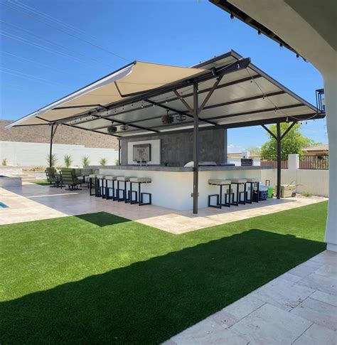 Installing Artificial Grass How Retractable Awnings Protect Your Turf