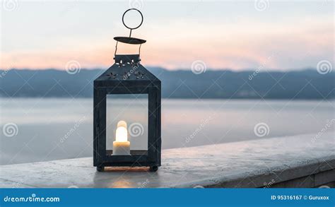 Close Up Of Black Lantern Shines At Sunset Stock Image Image Of Beach