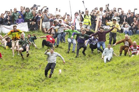 Throw Yourself Off The Top Daredevils Enter Cheese Rolling Race Cgtn