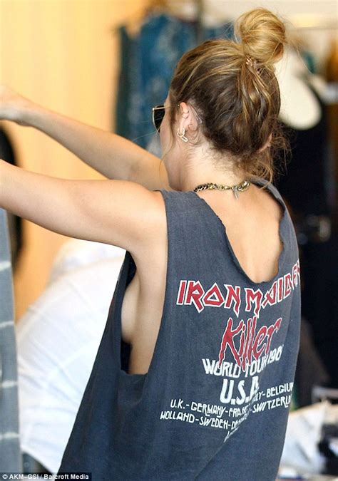 Miley Cyrus Exposes Side Boob In A Gaping Iron Maiden T Shirt Daily