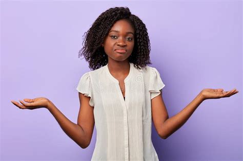 Doubtful Shocked African Woman Shrugging Shoulders Stock Photo Image