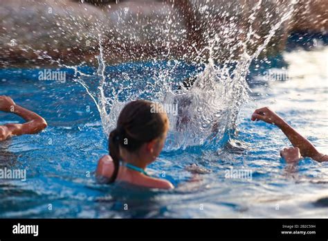 Children Splashing Hi Res Stock Photography And Images Alamy