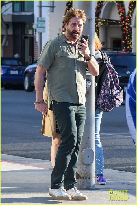 Gerard Butler Shares A Laugh With Fans While Arriving At Lunch Photo