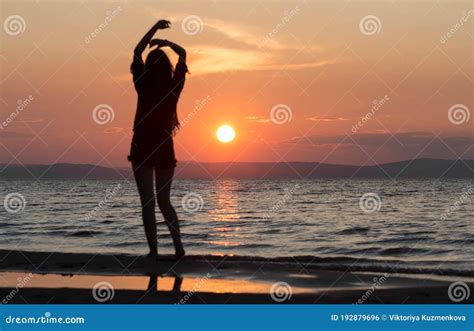 Beautiful Dancing Girl On The Beach During Sunset Stock Photo Image Of Girl Brilliant