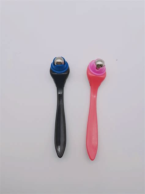 China Promotion Custom Facial Beauty Roller Plastic Handheld Massager