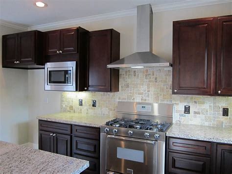 We continuously monitor the markets and make changes where necessary. statment granite behind kitchen chimney hood | ... Style ...