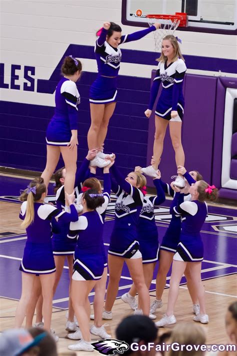 A Group Of Cheerleaders Perform On The Court