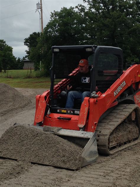 Jeff Danker Of Major League Bowhunter Operating A Skid Steer From Great