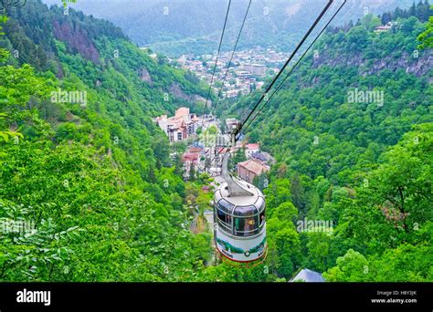 The Small Cable Car Among The Green Mountains Of Borjomi Kharagauli