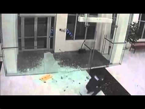 Man Walks Through Glass Doors Youtube