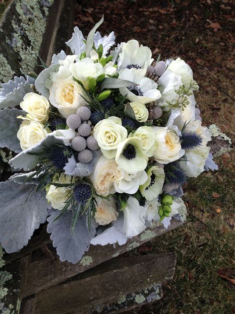 White Garden Roses Anemones Freesia With Silver Brunia Dusty Miller
