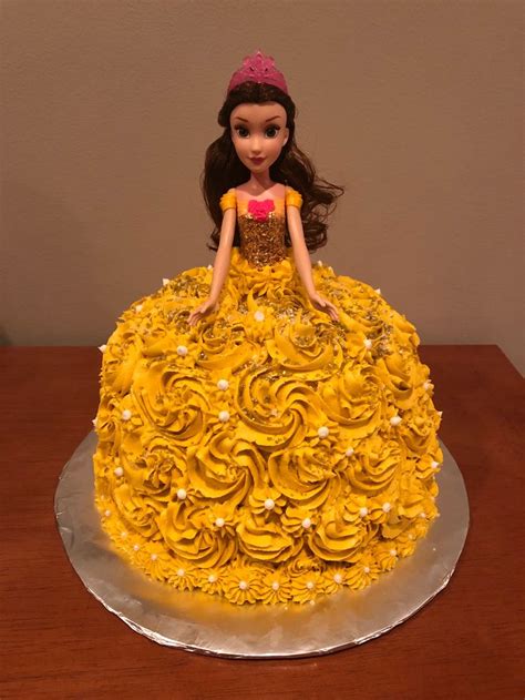 Seeing her doll in all pink flared gown is every girl's dream. Belle doll cake. (With images) | Doll cake, Disney ...