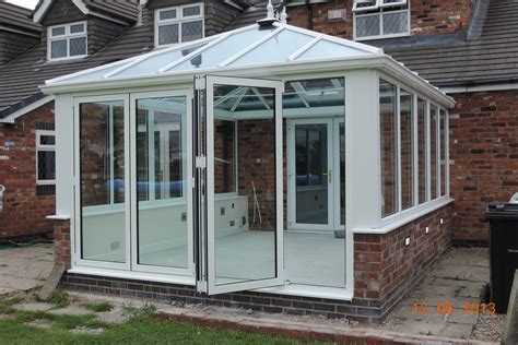 Conservatory With Bi Folding Doors And Self Cleaning Glass Roof