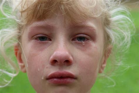 Closeup Of A Young Girl With Tears Rolling Down Her Cheek Photograph By