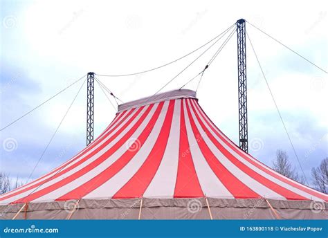 Large Peaks On Red And White Striped Circus Big Top Tent Stock Photo