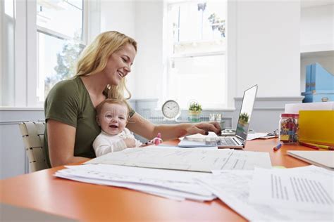 Busy Mother Working From Home With Daughter Stock Image Image Of