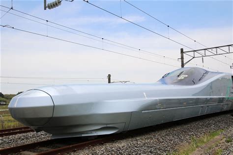 Photography from air or space. Superfast bullet train that rivals airplane flying times ...