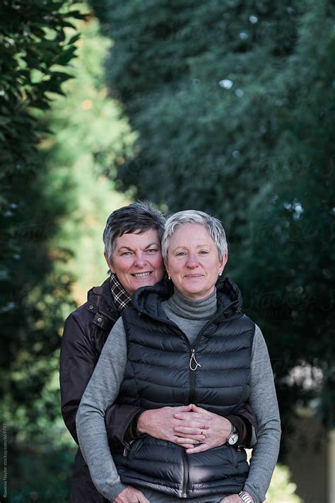 Mature Lesbian Couple Embracing By Stocksy Contributor Rowena Naylor