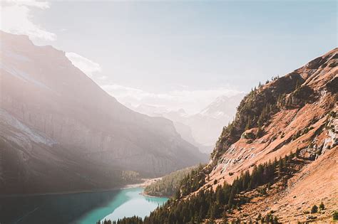 Lake Between Mountains During Daytime Hd Wallpaper Peakpx