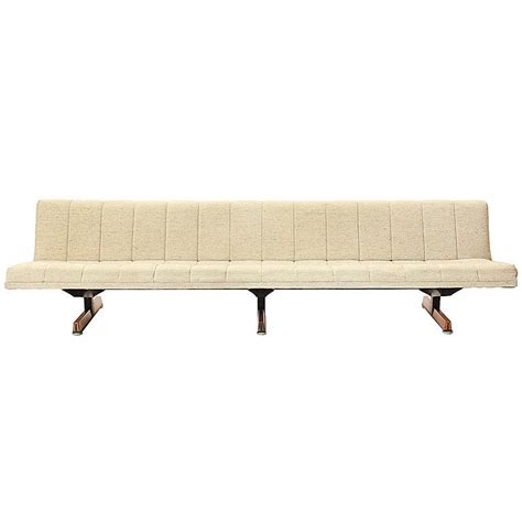 Contemporary upholstered bench simple and relaxed and accessible from all sides, the daybed is the perfect solution for a large open space. upholstered sofa bench at 1stdibs