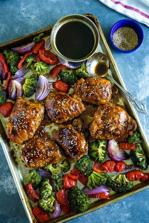 Spread chicken and veggies on a baking sheet, sprayed with cooking spray. Easy Sheet Pan Sesame Chicken with Vegetables - Must Love Home