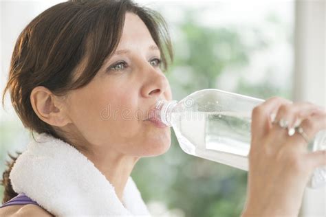 Woman Drinking Water After Exercise Stock Image Image Of Away Mature
