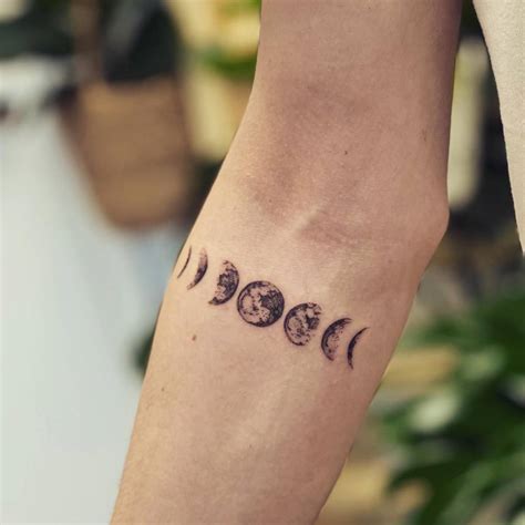 Micro Realistic Moon Phases Tattoo On The Inner