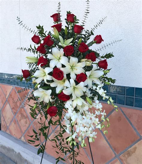 Lily and Rose Tribute Spray by Teleflora in Highland, CA | Hilton's Flowers