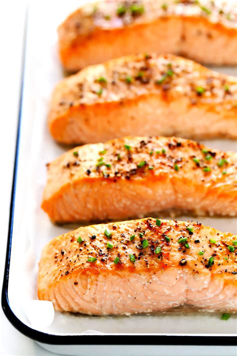 This recipe for broiled salmon is fresh fish fillets coated in olive oil, garlic and herbs, then broiled until browned. Baked Salmon | Gimme Some Oven
