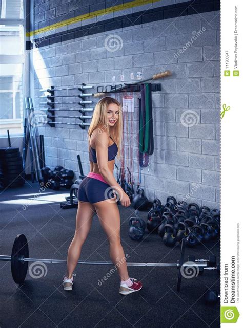 Blond Female With Barbell In A Gym Stock Image Image Of Power Body