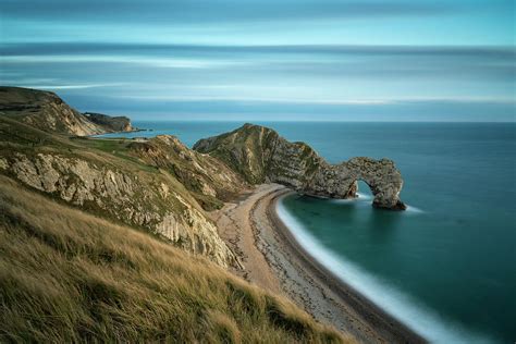 Durdle Door At Sunset Photograph By Fotosearch Pixels