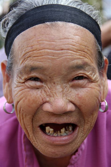 I was just curious if you had any. Photo: A Very Smiling (and Toothless) Old Chinese Lady