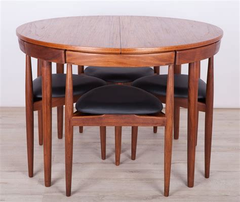 This dining set includes a table, four side chairs and bench. For sale: Mid Century Teak Dining Table & 4 Chairs by Hans Olsen for Frem Røjle, 1950s in 2020 ...