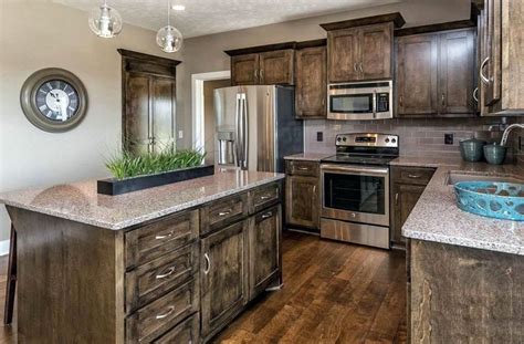 We were faced with this dilemma last year as we were. 27 Small Kitchens with Dark Cabinets (Design Ideas ...