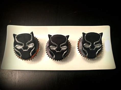 The black panther himself was center stage as a standee, centered against the backdrop with his claw positioned as if it were grabbing the birthday cake. 12 Black Panther Fondant Cupcake Toppers | Fondant cupcake ...