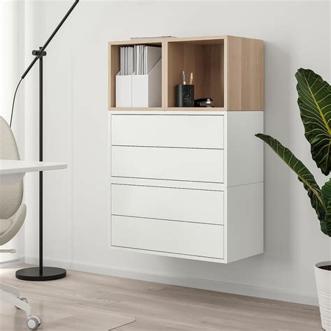This tall cabinet is constructed from manufactured wood and features a functional modern design that is an excellent choice for your home. EKET Wall-mounted cabinet combination - white, white ...