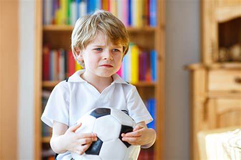 Kid Boy Sad About Lost Football Or Soccer Game Stock Photo Download Image Now Istock