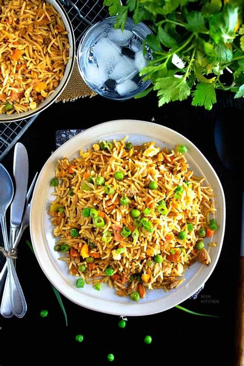 Heat the cooking oil in a wok or frying pan. Tuna Fried Rice | Video | Nish Kitchen in 2020 | Tuna ...