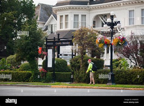 Man Walks Past The Pendray Teahouse In The Gatsby Mansion Victoria