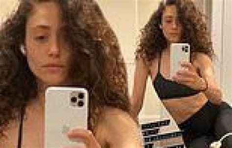 Emmy Rossum Shows Off Toned Abs As She Poses In Sports Bra And Leggings