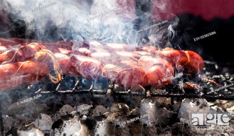 Close Up View Of Many Chorizos On A Barbecue Stock Photo Picture And