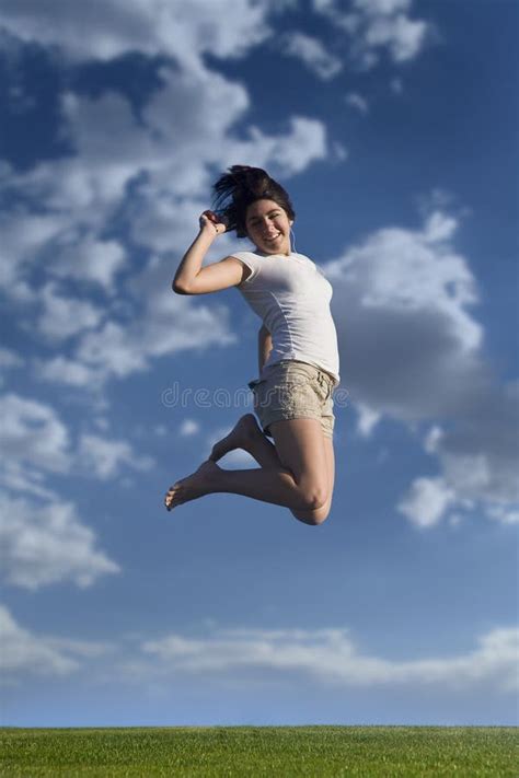 Teen Girl Jumping High In The Sky Stock Photo Image Of Wire Jumping
