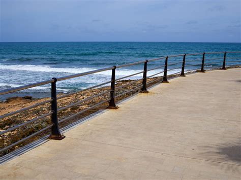 Beautiful Beach Seaside Promenade With Metal Railings Stock Image