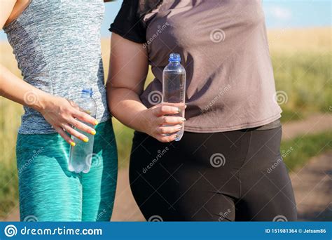 Women Drink Water And Rest After Outdoor Jogging Stock Photo Image Of