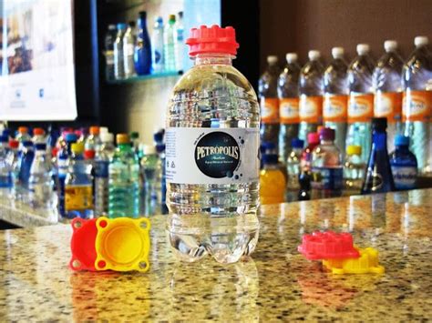 Clever Caps Water Bottle Design Creative Packaging Design Bottle Design