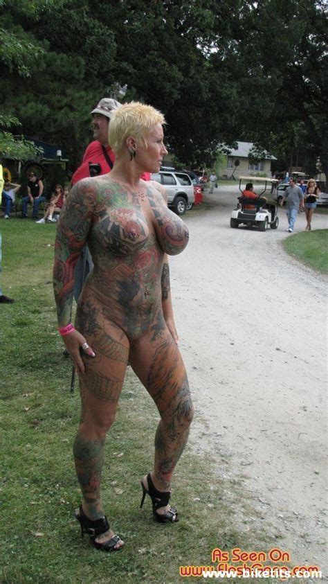 Thoroughly Tattooed Blonde Chubby Milf Looking