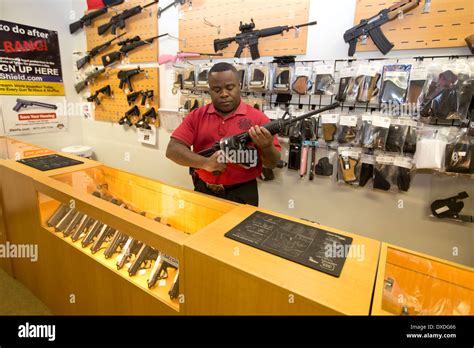 Gun Store In Austin Texas Includes Small Handguns And Rifles Stock